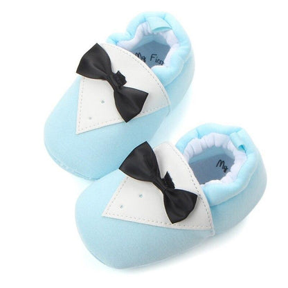 Blue baby first walker shoes with white triangular patch and black bow, cotton infant prewalker on Tampa Home & Garden Store