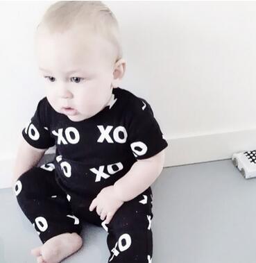 Baby boy 2-piece clothing set black T-shirt and pants with white XO print Stevvex on Tampa Home & Garden Store