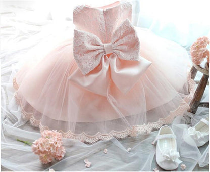Stevvex pink baby baptism dress with large back lace bow and tutu white shoes on Tampa Home & Garden Store