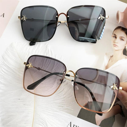 Stevvex oversized square sunglasses with bee accents, black gradient lenses and gold frame, 2pcs on Tampa Home & Garden Store