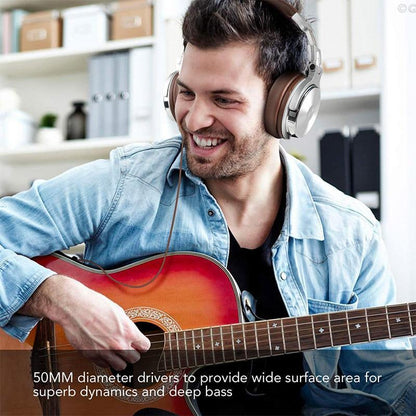 Stevvex DJ Headphones with mic over-ear wired, brown-silver, worn by a man with a red guitar on Tampa Home & Garden Store