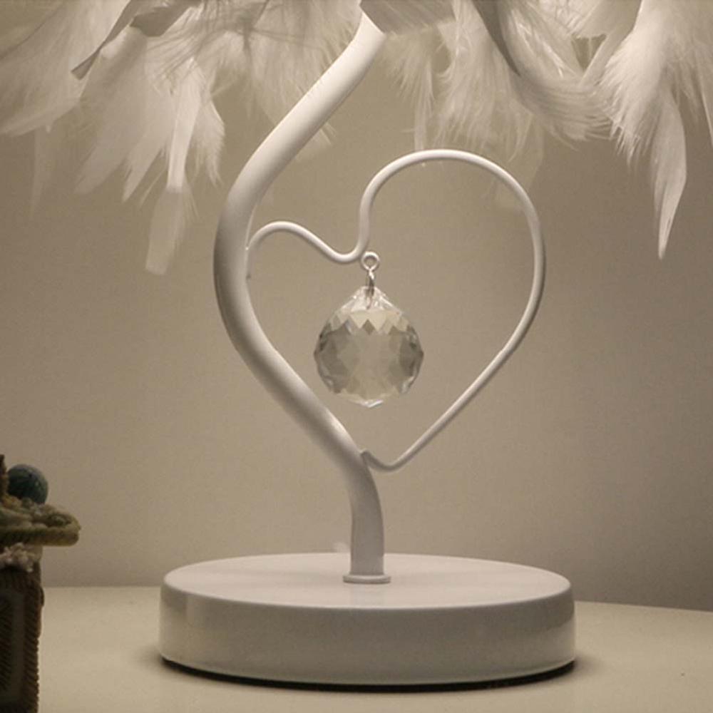 Stevvex heart-shaped crystal table lamp with hanging faceted crystal ball on white base on Tampa Home & Garden Store