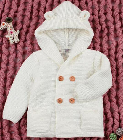 Stevvex white knit baby cardigan with hood, brown buttons and front pockets for newborns on Tampa Home & Garden Store