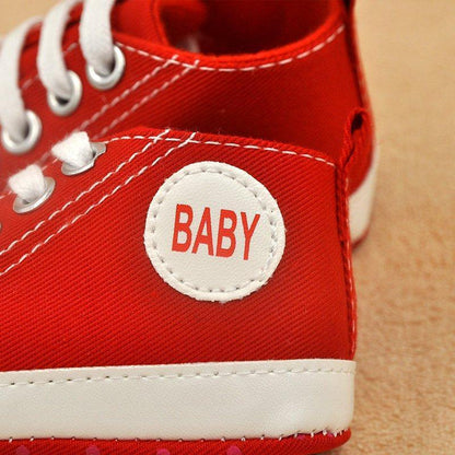 Red canvas baby sneakers with white laces and sole, BABY patch, Stevvex First Walkers on Tampa Home & Garden Store