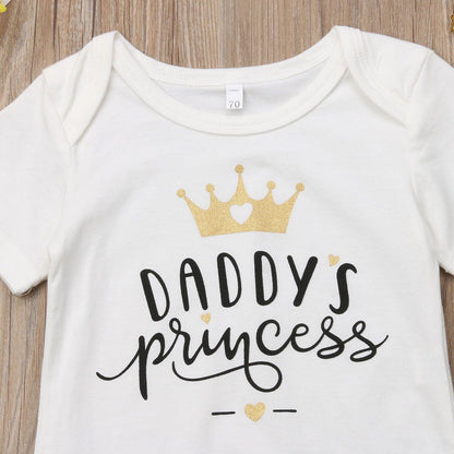 White baby girl bodysuit with gold crown graphic and Daddy's princess script on Tampa Home & Garden Store