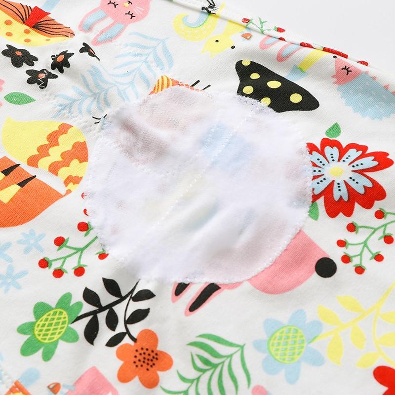 Stevvex baby swaddle blanket with colorful floral print and round white patch center on Tampa Home & Garden Store