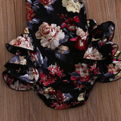 Floral baby romper set by Stevvex with sleeveless jumpsuit and headband, black blooms on Tampa Home & Garden Store