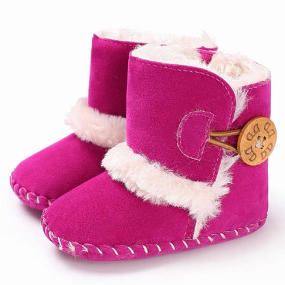 Stevvex pink newborn baby boots with white faux fur trim and strap button, pair for first steps on Tampa Home & Garden Store