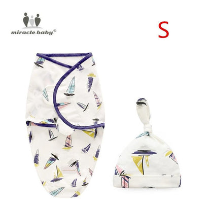 Stevvex 2pc baby swaddle blanket with cap set in sailboat print, purple trim on Tampa Home & Garden Store