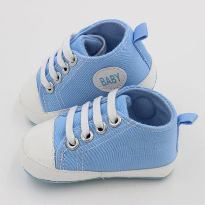 Stevvex blue canvas baby sneakers with white toe caps and laces, pair for first steps on Tampa Home & Garden Store