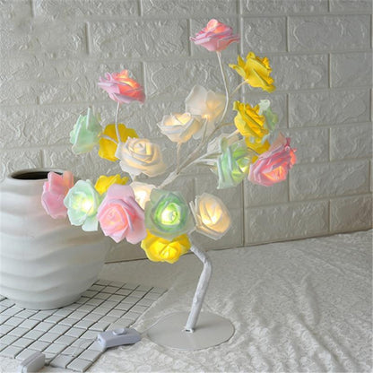 Stevvex rose-shaped table lamp with pastel LED roses on a white tree-trunk stem and base on Tampa Home & Garden Store