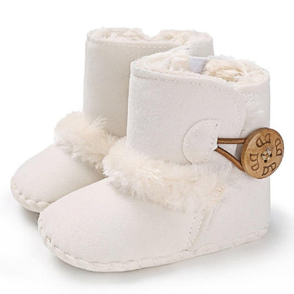 Stevvex white newborn baby snow boots with faux fur lining and wooden button strap pair on Tampa Home & Garden Store