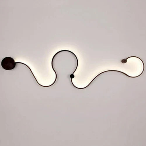DecorBites LED Aluminum Wall Lamps, black aluminum wall light with soft backlit wavy design on Tampa Home & Garden Store