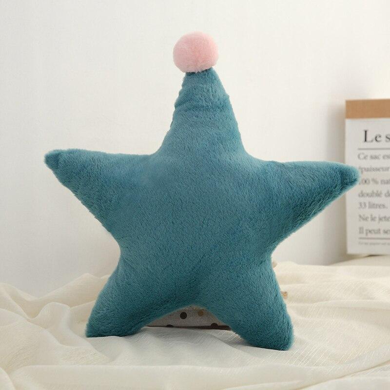 Blue star-shaped plush nursing pillow by Stevvex with pink pom-pom topper on Tampa Home & Garden Store