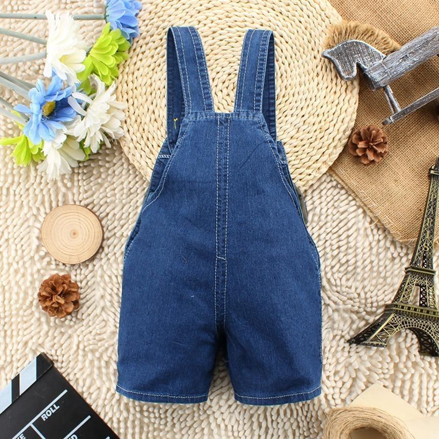 Blue denim baby romper overalls with adjustable straps and knee-length shorts on Tampa Home & Garden Store