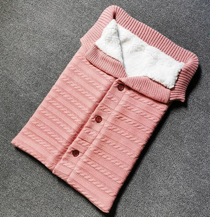 Stevvex pink knitted baby swaddling blanket with white sherpa lining and button-front design on Tampa Home & Garden Store