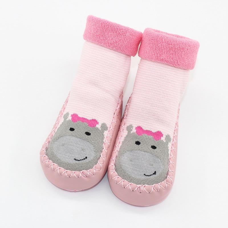 Stevvex baby warm stretchy booties with rubber soles pink with grey cartoon face pair on Tampa Home & Garden Store