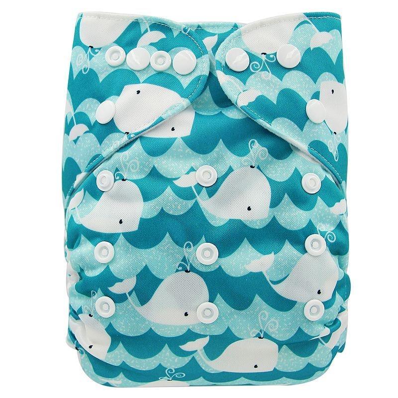 Baby cloth diaper Stevvex with whale pattern in turquoise waves and front snap closures on Tampa Home & Garden Store