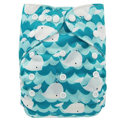 Baby cloth diaper Stevvex with whale pattern in turquoise waves and front snap closures on Tampa Home & Garden Store