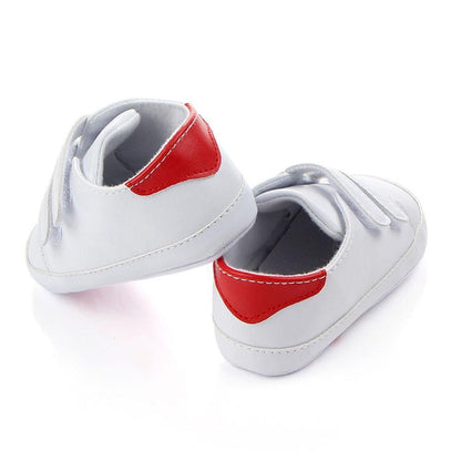 Stevvex white baby soft sole sneakers pair with red heel patches and Velcro straps on Tampa Home & Garden Store