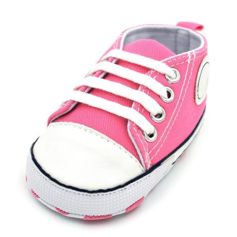 Pink canvas toddler sneaker by Stevvex with white toe cap, laces and anti-slip sole on Tampa Home & Garden Store