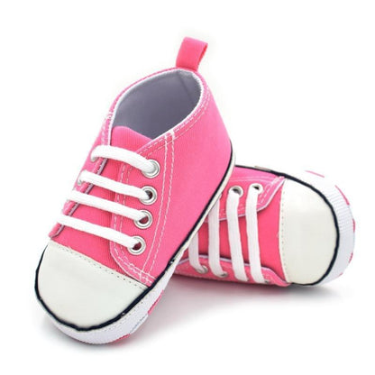 Classic Canvas Baby Sneakers Stevvex pink with white toe cap and laces, pair on Tampa Home & Garden Store