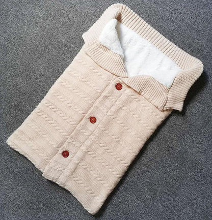 Baby swaddle blanket Stevvex beige knit wool with white fleece lining and brown buttons on Tampa Home & Garden Store