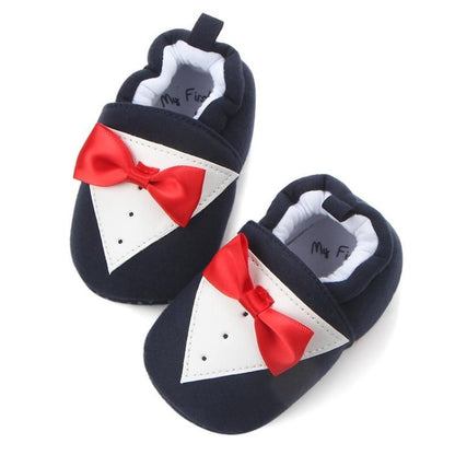 Stevvex navy baby pre-walker shoes pair with white tuxedo panel and red bow for boys on Tampa Home & Garden Store
