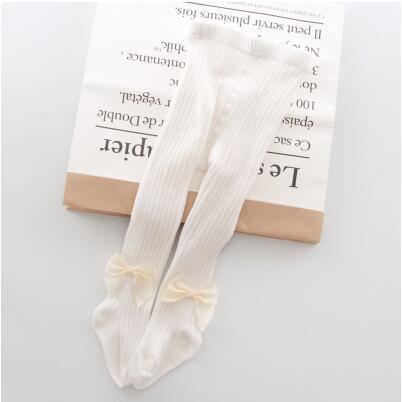 White ribbed cotton baby tights with bow knots by Stevvex infant knit tights on Tampa Home & Garden Store