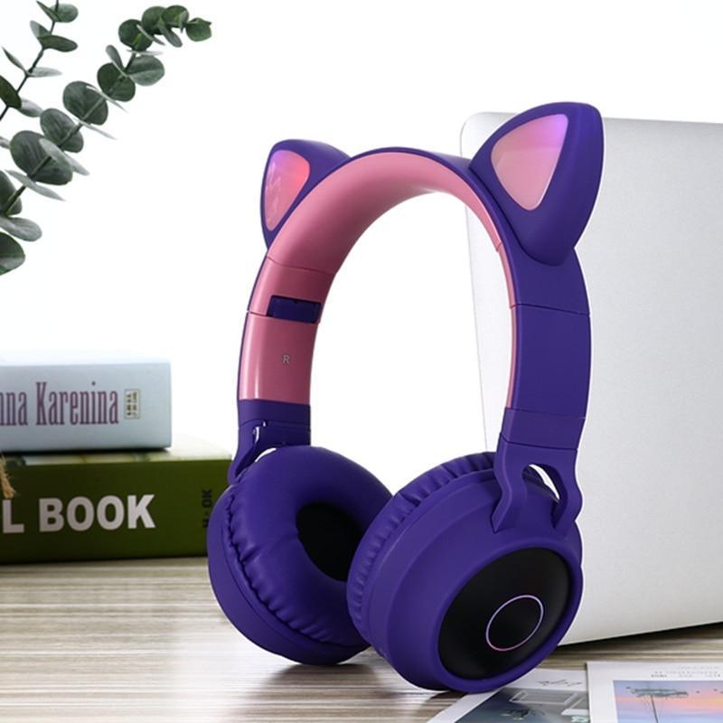 Stevvex purple cat-ear over-ear headphones with pink inner band on desk on Tampa Home & Garden Store