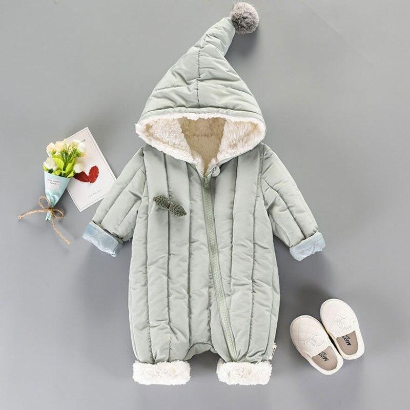 Newborn baby hooded quilted jumpsuit in light sage with fleece-lined hood and front zipper on Tampa Home & Garden Store