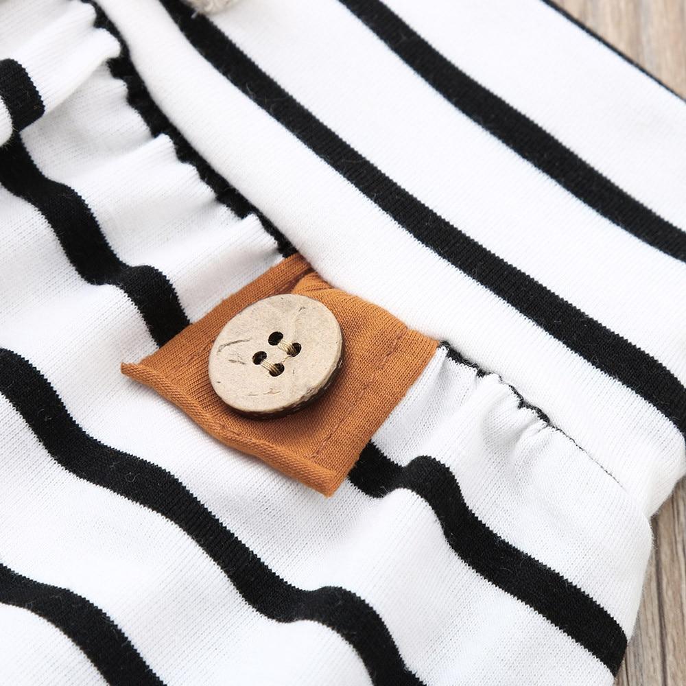 Stevvex baby striped pajama top with white/black stripes orange cuff and wooden button detail on Tampa Home & Garden Store