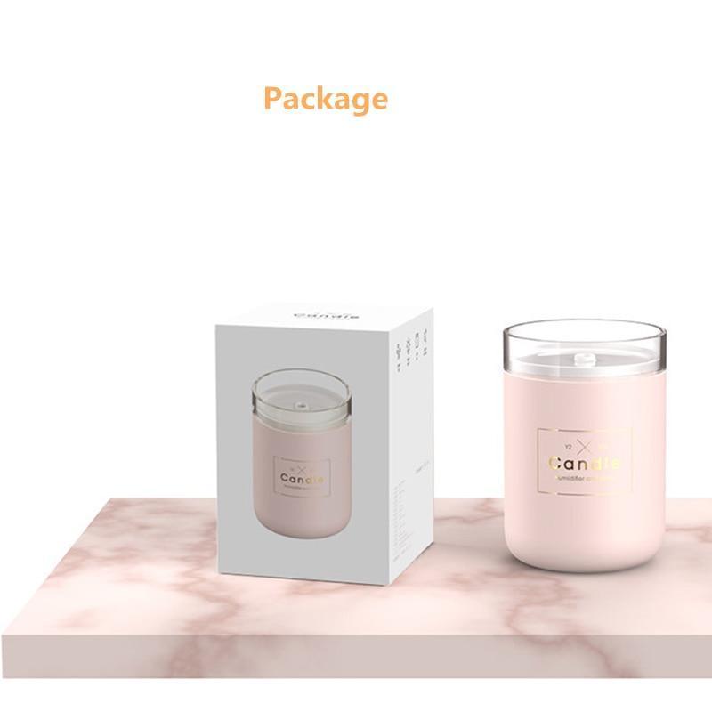 Stevvex 280ML Ultrasonic Humidifier Candle pink with clear lid, shown with its box on Tampa Home & Garden Store