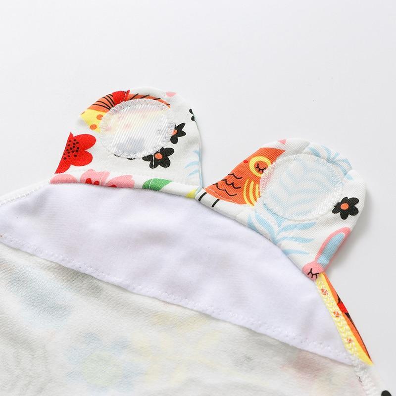 Baby swaddle sleeping bag Stevvex with colorful printed hood featuring ears and white lining on Tampa Home & Garden Store