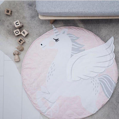 Round pink unicorn baby play mat with white wings and plush texture on Tampa Home & Garden Store
