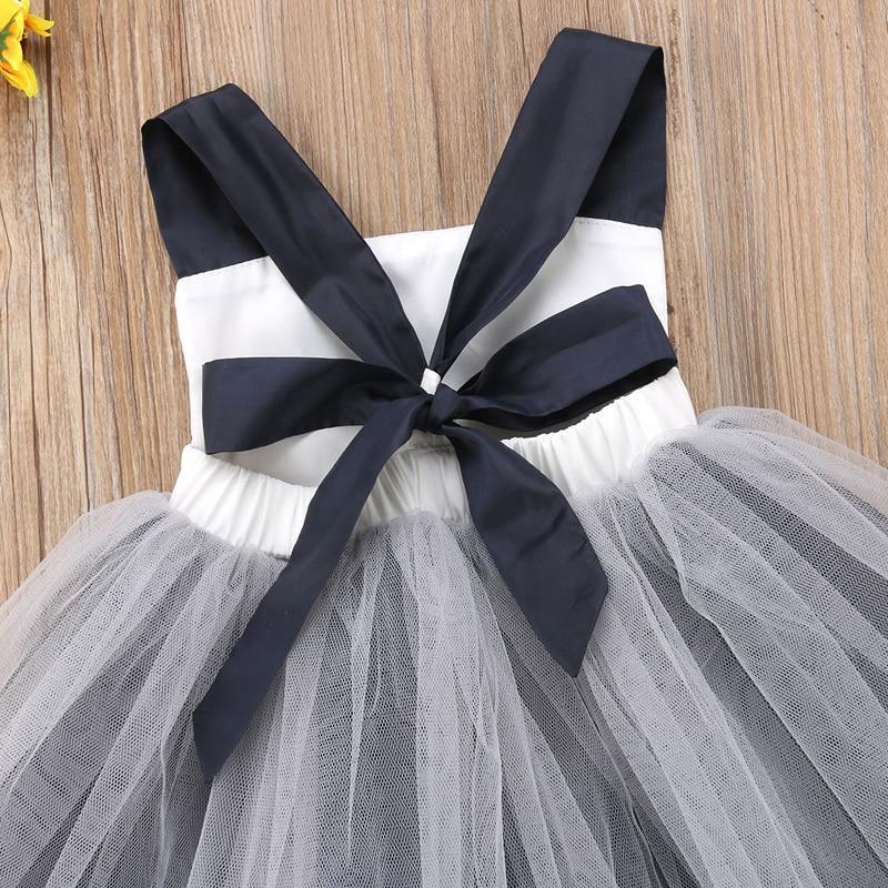 Infant toddler girls Halloween dress with white bodice and navy sash bow on tulle skirt Stevvex on Tampa Home & Garden Store