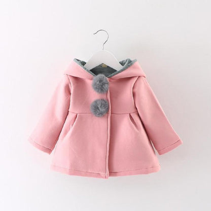 Newborn girls pink coat with gray faux fur pom-poms and hooded gray lining on Tampa Home & Garden Store