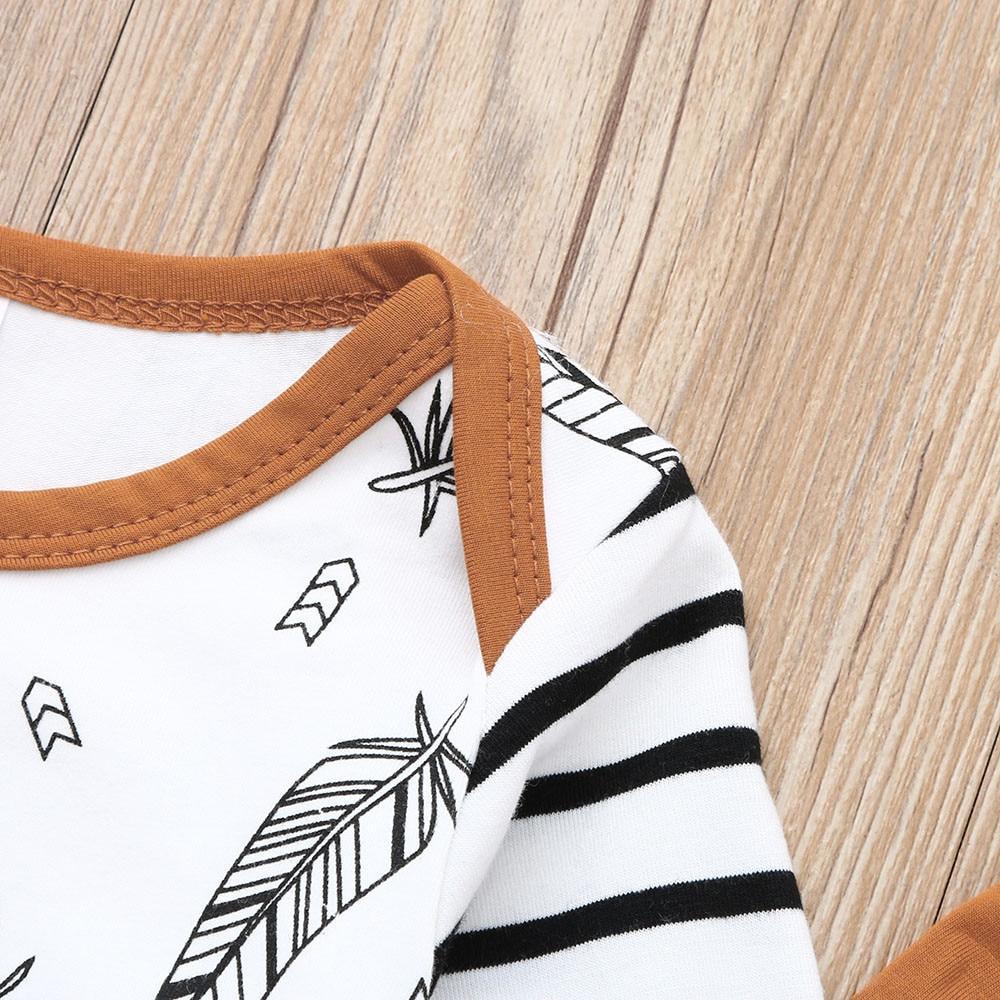 Stevvex Modern Babz baby pajama top with white body, brown trim neckline and striped sleeves on Tampa Home & Garden Store