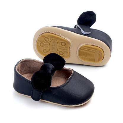 Stevvex infant girl first walkers bowknot shoes, navy upper, beige sole, two shoes shown on Tampa Home & Garden Store