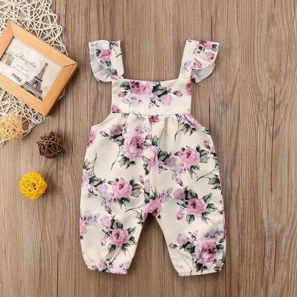 Floral romper jumpsuit for baby girls with ruffle straps, cream background Stevvex on Tampa Home & Garden Store