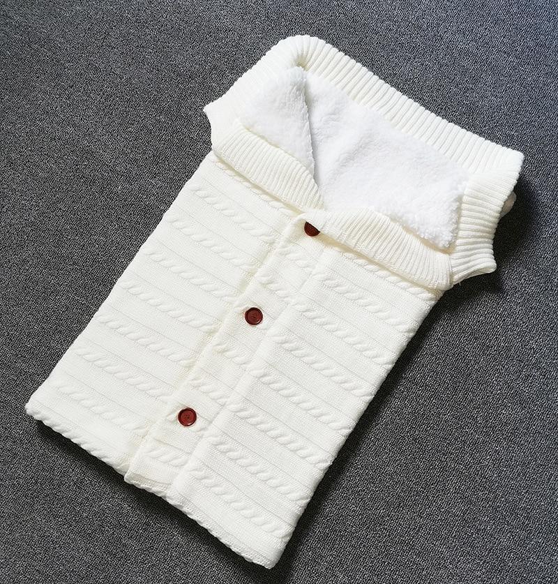 Stevvex white knitted baby swaddle wrap with hood, cozy wool knit and wooden buttons on Tampa Home & Garden Store