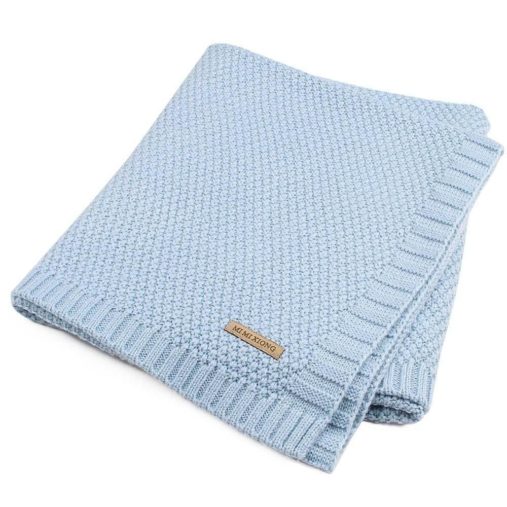 Blue knitted baby swaddle blanket with ribbed border, soft newborn bedding on Tampa Home & Garden Store