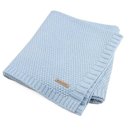Blue knitted baby swaddle blanket with ribbed border, soft newborn bedding on Tampa Home & Garden Store