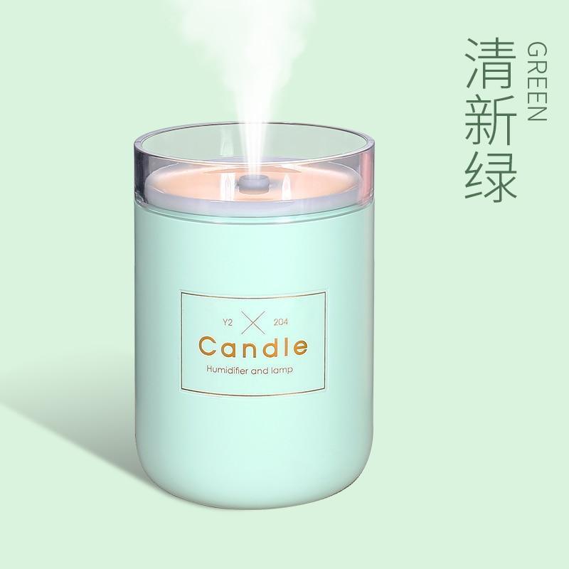 Stevvex 280ml ultrasonic candle humidifier and USB diffuser in mint green with soft light on Tampa Home & Garden Store