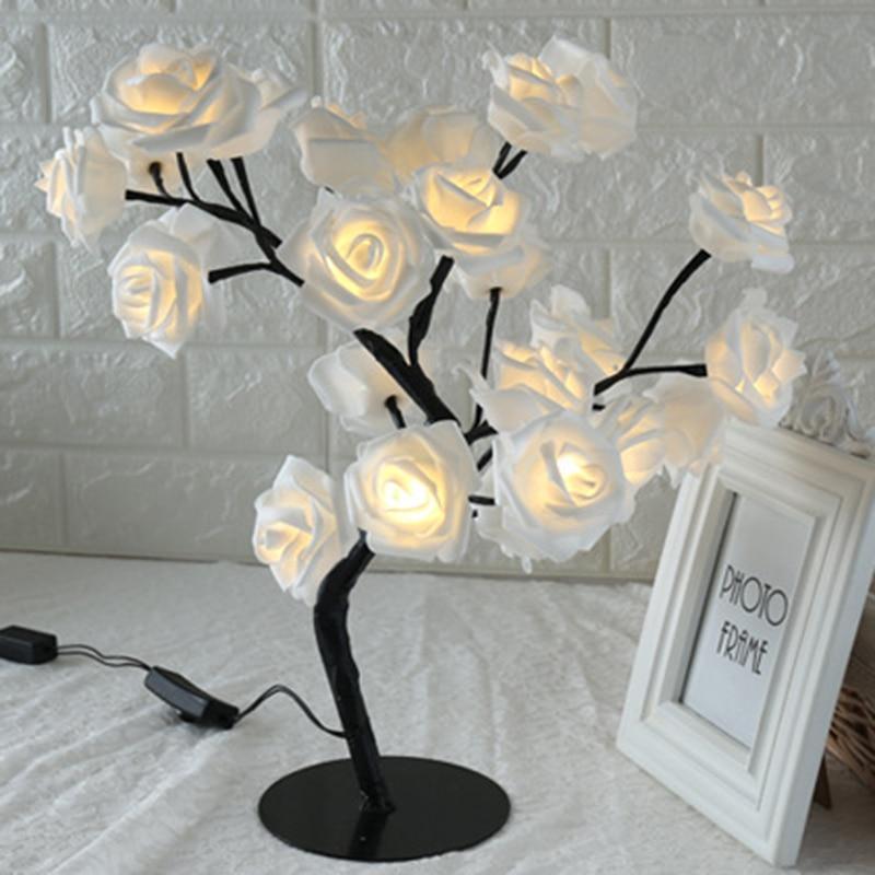 Stevvex rose-shaped table lamp with white petals on a black stem, decorative living room light on Tampa Home & Garden Store