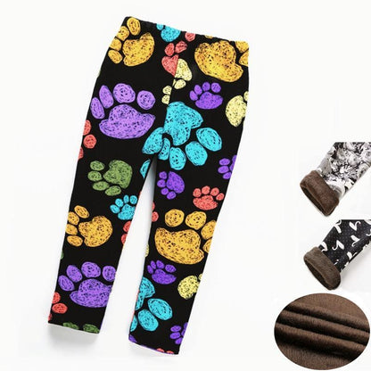 Stevvex kids thick leggings with multicolor paw print pattern on black background on Tampa Home & Garden Store