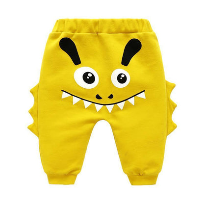 Cartoon monster baby pants Stevvex yellow with big eyes and side fin accents on Tampa Home & Garden Store