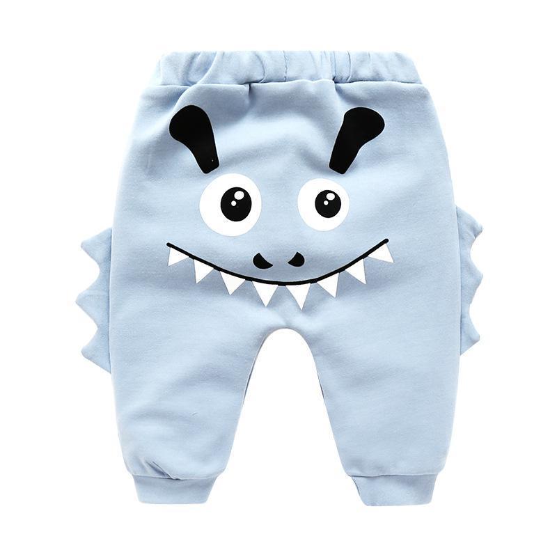 Stevvex light blue baby pants with cartoon monster face, big eyes, toothy grin, side fins on Tampa Home & Garden Store