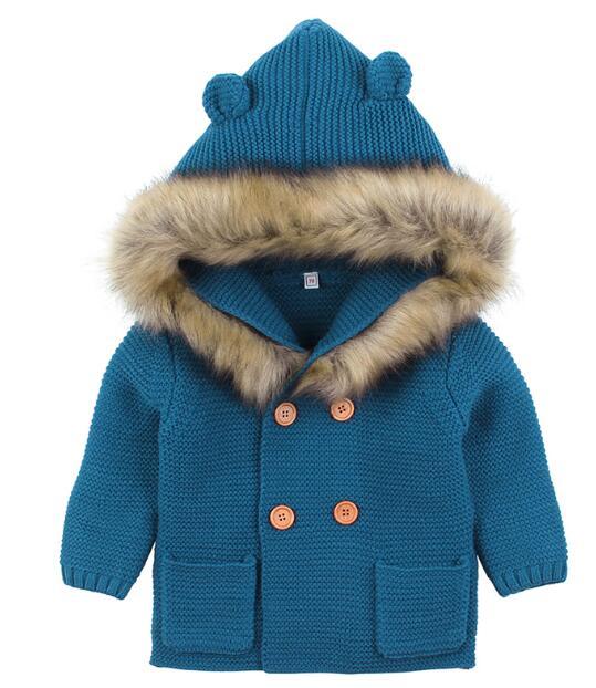 Stevvex newborn blue knit hooded cardigan coat with faux fur trim and wooden brown buttons on Tampa Home & Garden Store