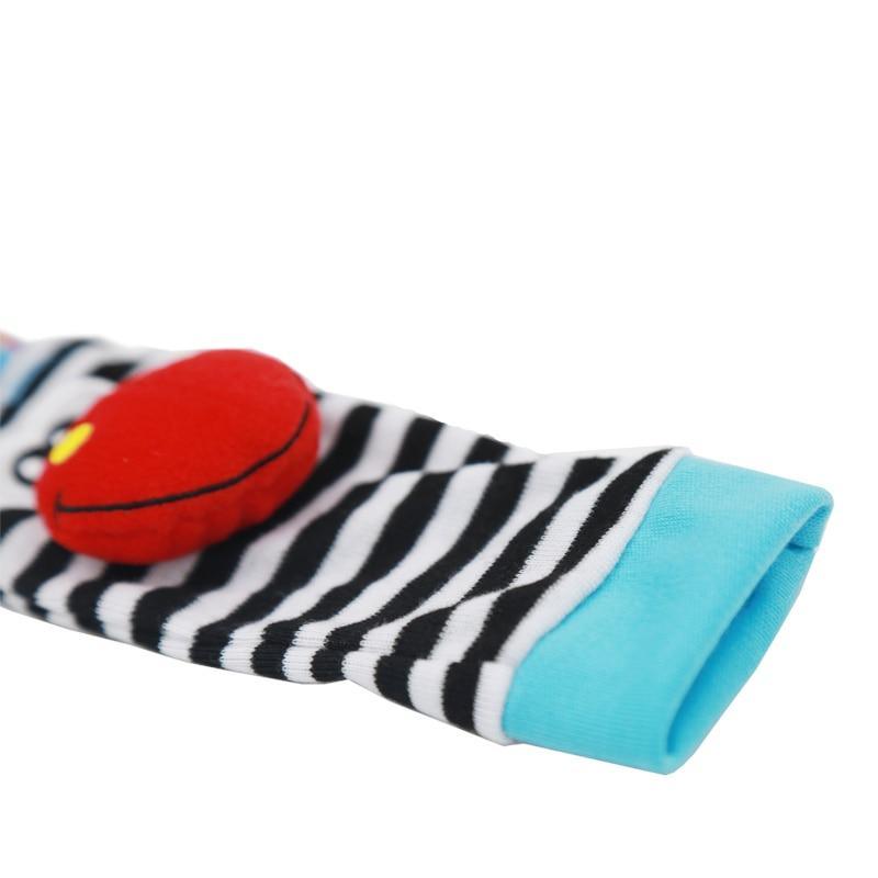 Stevvex wrist rattle sock for infants, striped black white with blue cuff and red heart on Tampa Home & Garden Store